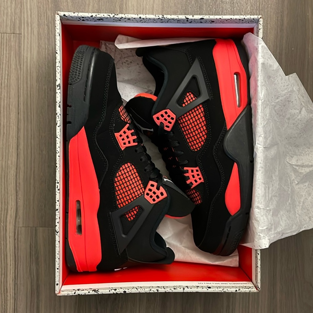 Air Jordan 4 Retro “Red Thunder” in pristine condition!